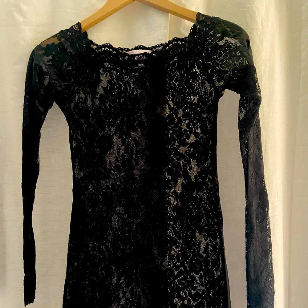 Victorias Secret black lace slip. Long sleeve stretchy. Worn once. Size S.